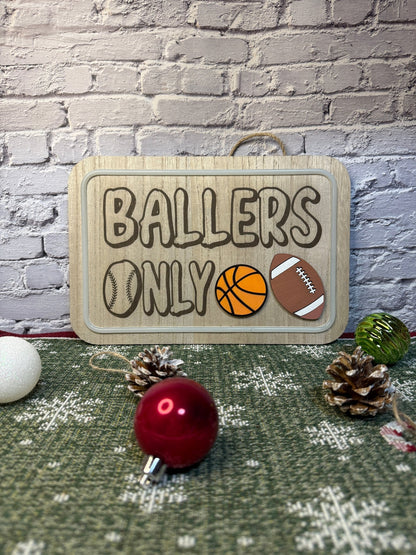 Lighted bedroom sign laser engraved with text ballers only and laser cut sports balls with light off